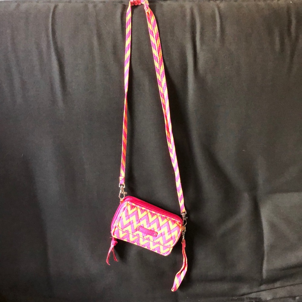Vera Bradley wallet/purse in pink/yellow zigzag pattern.